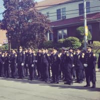 <p>Yonkers Police line up along Yonkers Avenue for the funeral of Lt. Roy McLaughlin.</p>