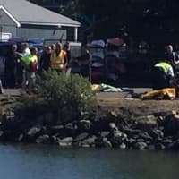<p>First responders work at the scene of a fatal accident at Cos Cob Harbor in Greenwich on Monday. </p>