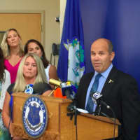 <p>Joe Fedorko speaks while his wife Pam looks on during the bill signing ceremony for &quot;Emily&#x27;s Law&quot; on Friday in Stamford. It&#x27;s named after their daughter Emily who died at the age of 16 last year in a water tubing accident off Greenwich Point. </p>