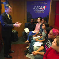 <p>Matthew McGuire, national account executive with C-SPAN, speaks with Westhill High School students on the C-SPAN Campaign 2016 Bus that was at the school on Thursday. The bus travels the country visiting schools, universities and political events.</p>