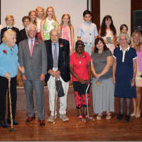 <p>Local students honored 12 local adults recently at the Pequot Library in an event called “Meet Our Local Heroes from the Community.” </p>