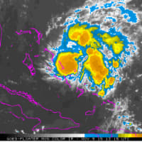 <p>Tropical Depression Twelve strengthened into Tropical Storm Kate Monday morning near the central Bahamas.</p>
