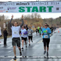 <p>Runners hit the finish line at Mima&#x27;s Meatball Mile for MSA Sunday in Danbury. </p>