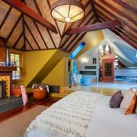 <p>The master bedroom at 78 Old Hill Road in Westport includes a fireplace. </p>