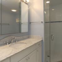 <p>The home&#x27;s master bathroom has also been nicely renovated.</p>