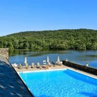 <p>A beautiful pond and pool await homeowners at Valeria in Cortlandt Manor. </p>