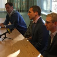 <p>Charles-Edouard Gros, middle, CEO of Center Management Group, speaks during a press conference announcing that the New York-based company will lease the Smith House nursing home.</p>