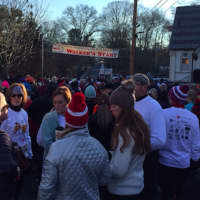 <p>People gather for the 38th Annual Pequot Runners Thanksgiving Day race in Southport.</p>