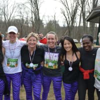 <p>Several runners at the Bedford Turkey Trot wore purple zebra-patterned leggings.</p>