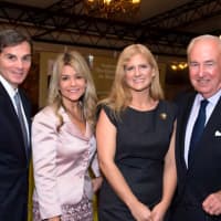 <p>Bill Mooney, right, President and CEO of the Westchester County Association, celebrates at the Fall Leadership Dinner with Joe DePaolo, Judy Huntington and Wilson Kimball. </p>