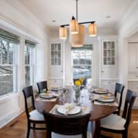<p>The dining room has gorgeous water views.</p>