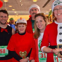 <p>Participants in the Jingle Bell 5k Run/Walk get ready for the event earlier this month.</p>