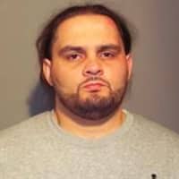 <p>Omar Figueroa of Norwalk is facing drug and vehicle charges after an arrest by New Canaan Police.</p>