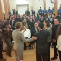 <p>State Sen. Nellie Pou administers the oath of office to Haledon Councilman Reynolds Martinez.</p>