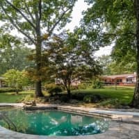 <p>A beautiful inground pool is located in the back yard.</p>