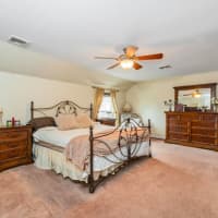 <p>A spacious master bedroom is one of the four bedrooms in the four bedroom colonial.</p>