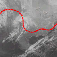 <p>A satellite image of the snowstorm that is expected to reach the East Coast by Friday, along with forecast track .</p>