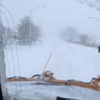 <p>A view from a plow cab on Cross County Parkway in Westchester late Saturday afternoon.</p>