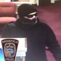 <p>A man described as a 5-foot-10 white male dressed all in black clothing robbed a bank in Brookfield on Monday afternoon.</p>