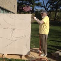 <p>Satish Joshi of Yonkers gets started on the sculpture.</p>