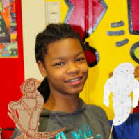<p>A RJ Bailey student with their completed shadow puppets.</p>