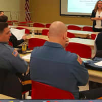 <p>Allison Bressler of Oradell leads a domestic violence educational workshop for first responders.</p>