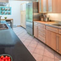 <p>The kitchen provides plenty of counter and cabinet space.</p>
