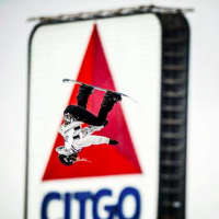 <p>Westport&#x27;s Julia Marino flips high above Fenway Park and its famous &quot;Citgo&quot; sign during a practice earlier this week. Marino won the Big Air competition Thursday night at Fenway.</p>