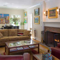 <p>The spacious living room is part of the home, which has 4,874 square feet.</p>