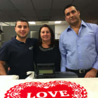 <p>Sandra Salazar along with her husband Omar Gomez have opened Capri&#x27;s Cuisine in Norwalk. Their son, Mathias Sellanes, at left, is the store manager.</p>