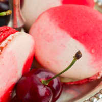 <p>Strawberry Macarons by Woops!</p>