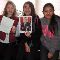 <p>Elizabeth Sagi, Angela Kohout and Madeline Murillo with a signed letter from President Barack Obama.</p>