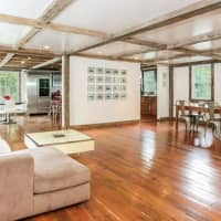 <p>The family room at 428 Quaker Road in Chappaqua.</p>
