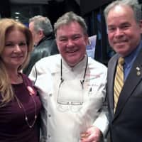 <p>Putnam County Executive MaryEllen Odell, left, and Rockland County Executive Ed Day flank Rockland restaurant titan Peter Kelly at the kickoff of Hudson Valley Restaurant Week.</p>