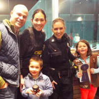 <p>The winner of the chili contest was the Broderick family, of Old Greenwich. Featured left to right in the back are Cris Broderick, Cristina Broderick, Officer Aran Santilli and Catherine Broderick. Jack Broderick is in the front.</p>