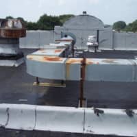 <p>Rusted ventilation system on the roof of Lincoln Elementary School in Hasbrouck Heights.</p>