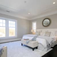 <p>The master suite is spacious and light.</p>