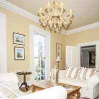 <p>Light pours into the parlor at the home, which has over 5,900 square feet and five bedrooms.</p>