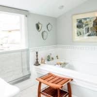 <p>The home includes an updated bathroom.</p>