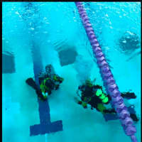 <p>Brookfield Police Department Divers taking their agility test</p>