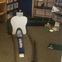 <p>Miniature golfers took to the course earlier this month at the Oakland Public Library.</p>