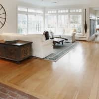 <p>Wide-plank flooring runs throughout much of the home.</p>