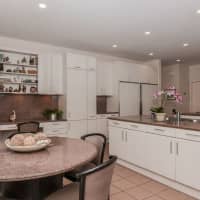<p>The kitchen features updated appliances.</p>