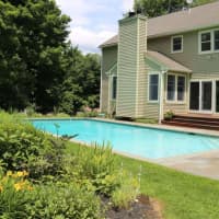 <p>A beautiful inground pool is part of the charm of the home.</p>