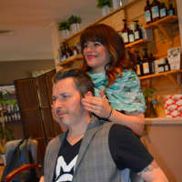 <p>Angela Alba styles husband James Alba&#x27;s hair at the B Hive Organic Salon in Hillsdale.</p>
