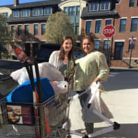 <p>Eastchester High School junior Lauren Gresia delivering sports equipment to ECAP with Anna Costa as part of her &quot;Play it Forward&quot; drive.</p>