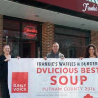<p>This is the banner that was stolen from Frankie&#x27;s Waffles &amp; Burgers in Mahopac. Above, Carina Evangelista, far right, and Marian Feliciotto of Frankie&#x27;s with Daily Voice Director of Media Initiatives/Managing Editor Joe Lombardi in March.</p>