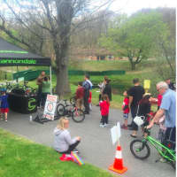 <p>Bicycle Center performing safety checks and letting people test drive some new bikes.</p>
