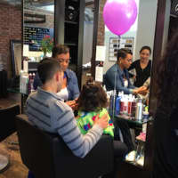 <p>A child receiving her special treatment hairstyle at La Jolie Salon &amp; Spa in Stamford. La Jolie recently partnered with the hair care company John Frieda, along with a number of other hair salons, for the annual &quot;HAIRraising Cut-A-Thon&quot; event.</p>