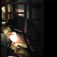 <p>Firefighters practiced using wire cutters to free themselves from entanglement, following a hose line to exit untenable conditions, passing through a simulated wall and buddy breathing with their SCBA.</p>
